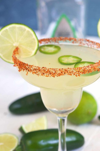 Frozen margarita cocktail with colorful garnish and refreshing presentation