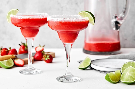 Strawberry margarita cocktail with fresh garnish and vibrant color presentation